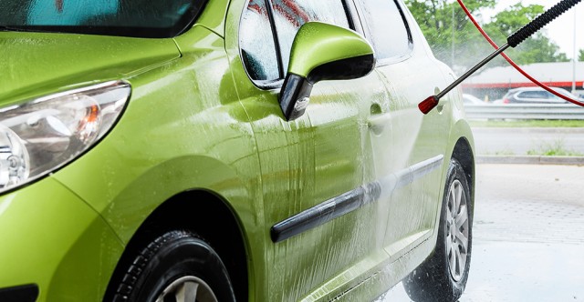 Bright green car being washed. Photo ID 58182896 © Blackay | Dreamstime.com
